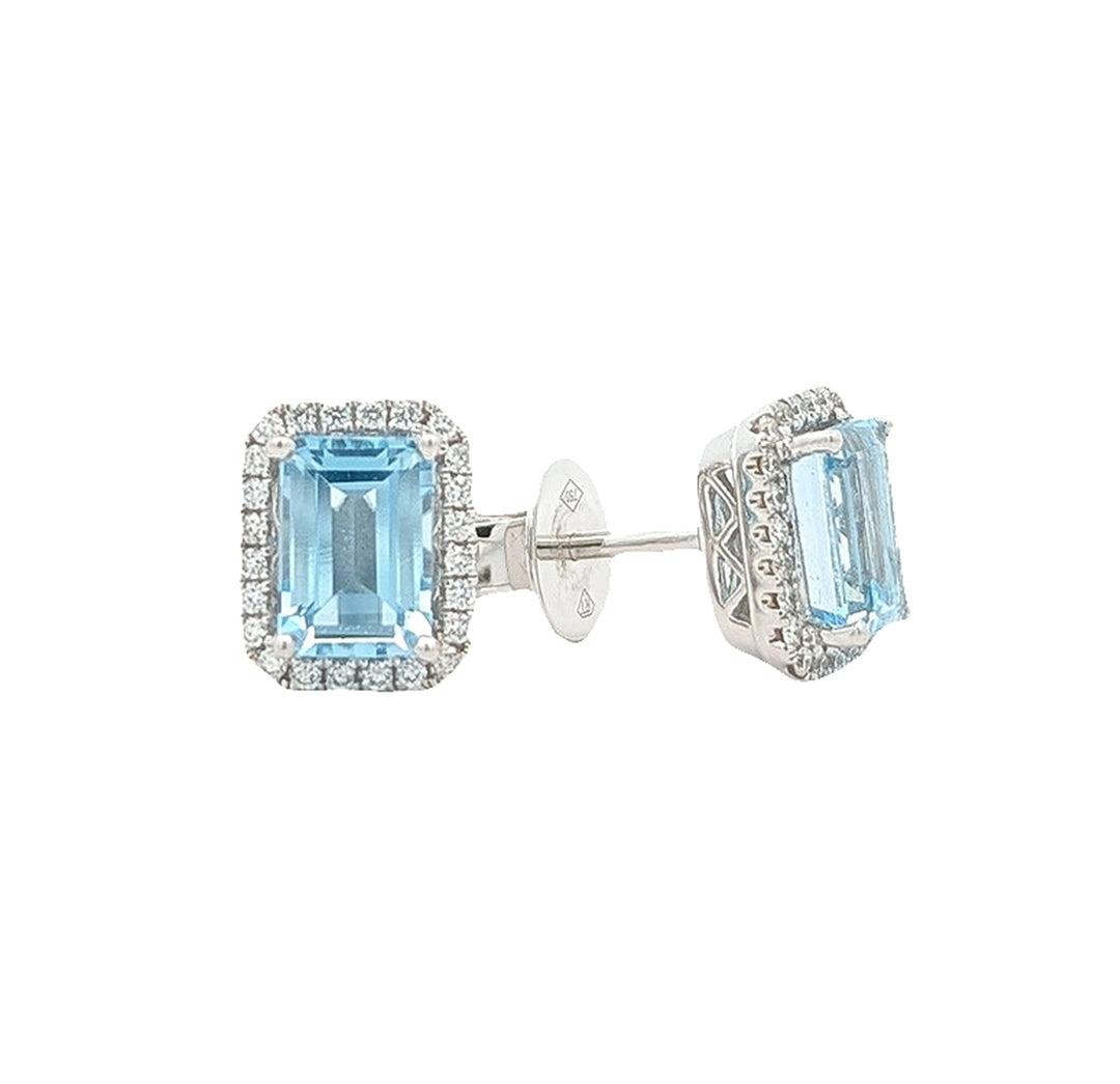 18KT White Gold Blue Topaz and 0.21ctw Diamond Stud Earrings