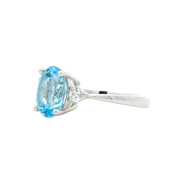18KT White Gold Topaz and 0.23ctw Diamond Ring