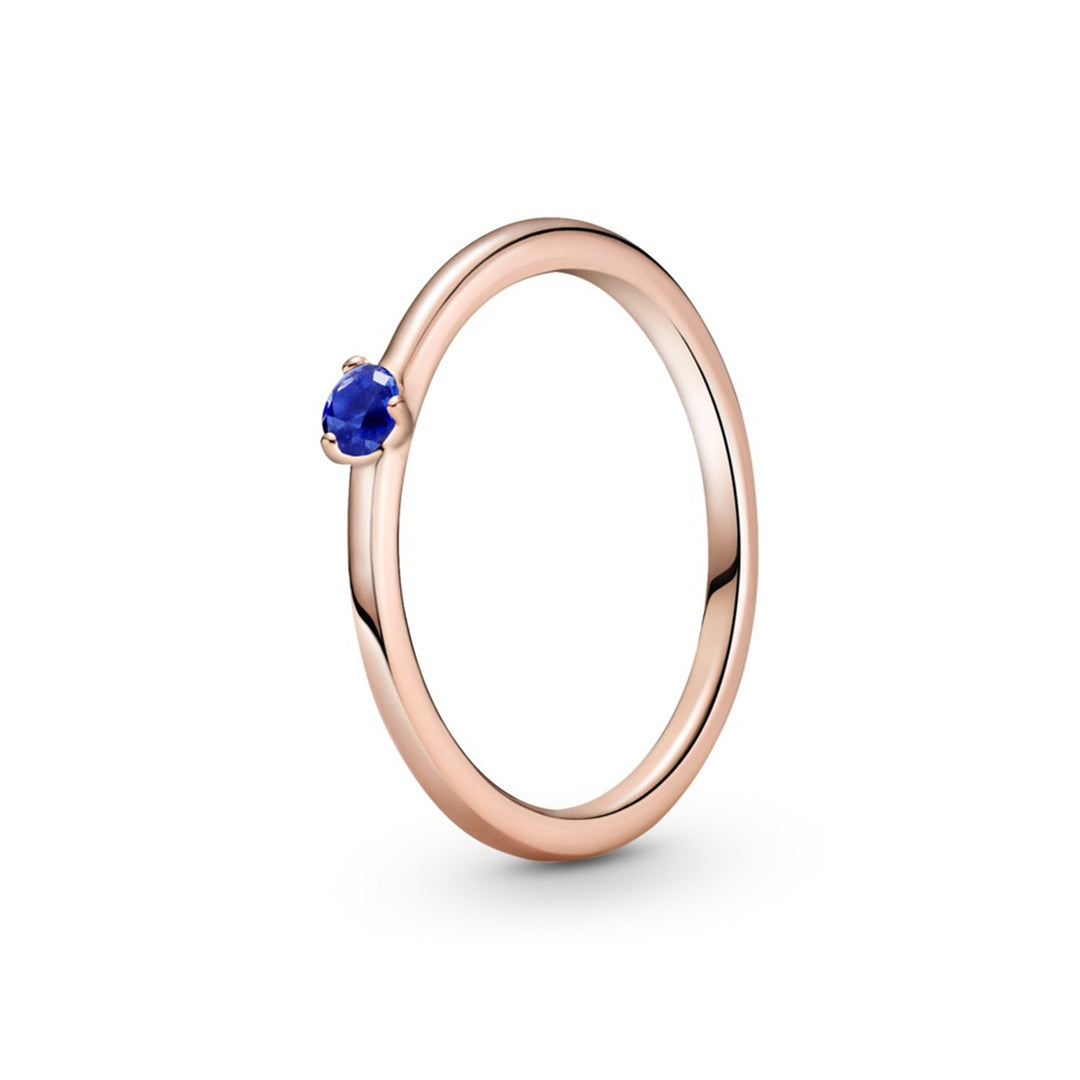 Rose ring with stellar blue crystal