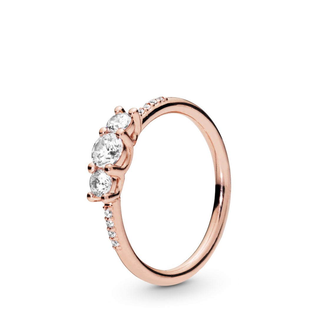 Ring in Rose with 3 claw-set and 8 bead-set clear CZ