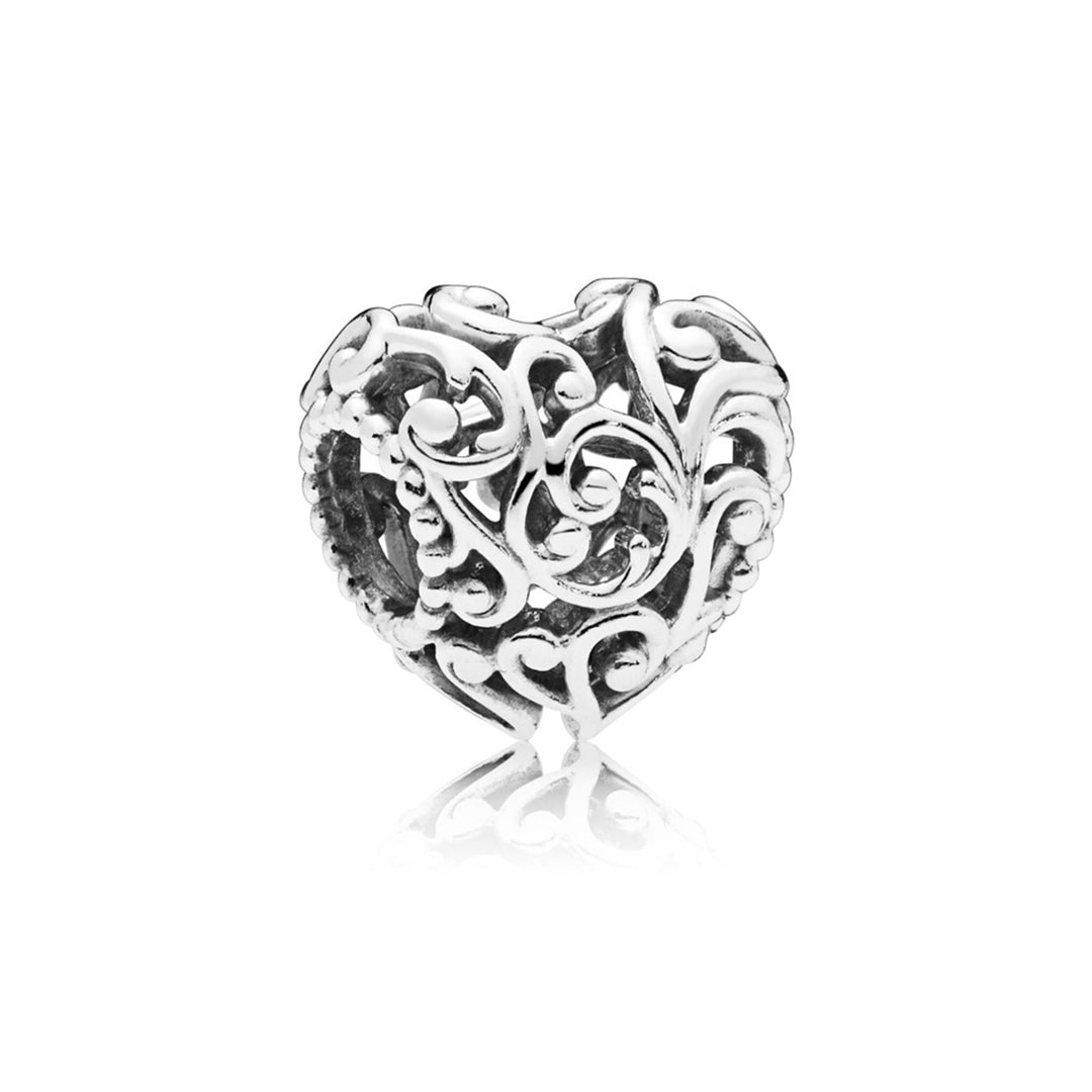 Regal pattern heart charm